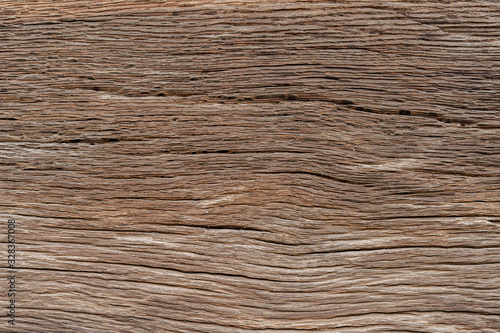 Texture od wooden planks. Wall made of antique wood. Raw wood after century.