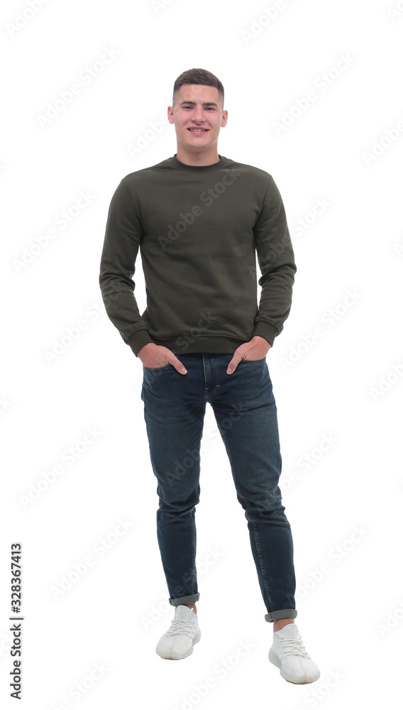 in full growth. smiling ordinary man in jeans in full growth. smiling ordinary man in jeans