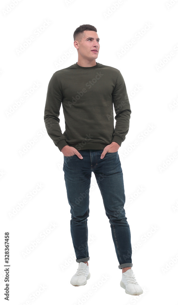 in full growth. smiling ordinary man in jeans in full growth. smiling ordinary man in jeans