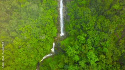 Aerial Shot Beautiful waterfall in the mountain. photo