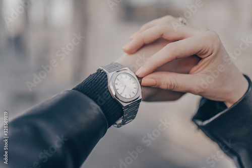 Fashion stylish silver watch on woman hand