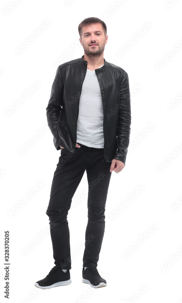 in full growth. stylish young man in black leather jacket in full growth. stylish young man in black leather jacket