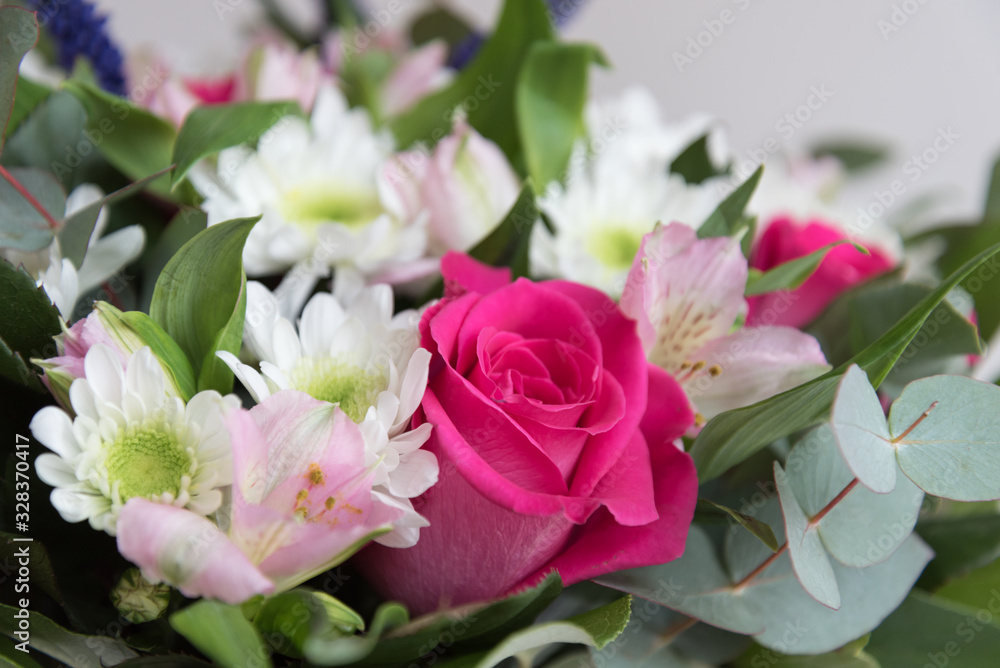 Pink roses and white chrysanthemums as background. Bouquet close-up. Postcard,