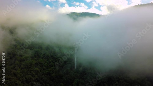 Aerial Shot Beautiful waterfall in the mountain. photo