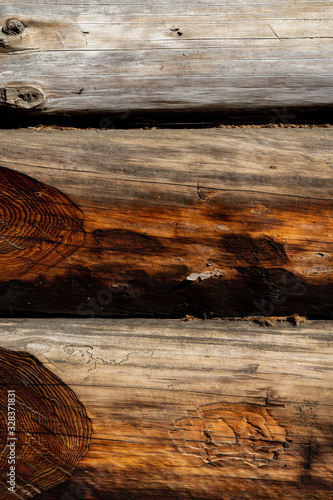 Texture od wooden planks. Wall made of antique wood. Raw wood after century.