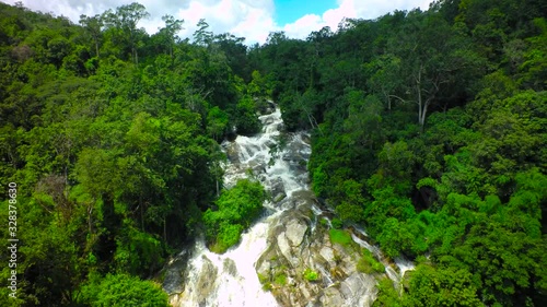 Aerial Shot Beautiful waterfall in the mountain. photo