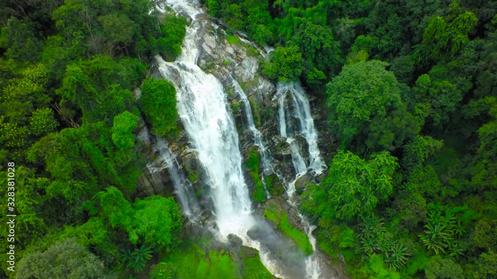 Aerial Shot Beautiful waterfall in the mountain. Aerial Shot Beautiful waterfall in the mountain.