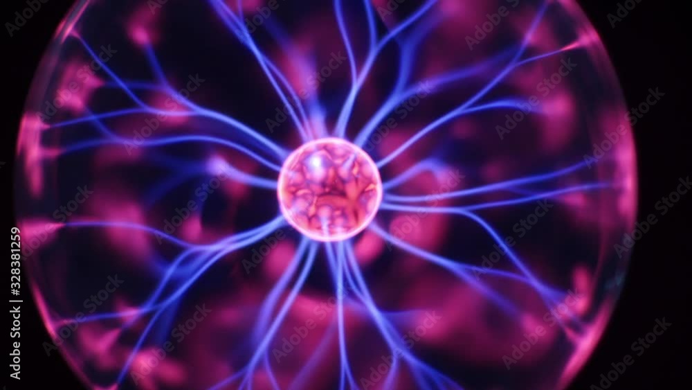 Moving sphere of Plasma lightning ball in a dark, Tesla discharge lamp