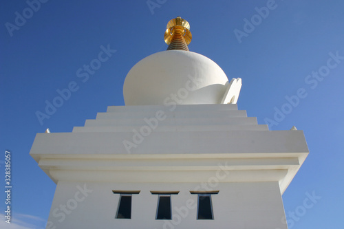 white mosque agains a blue sky