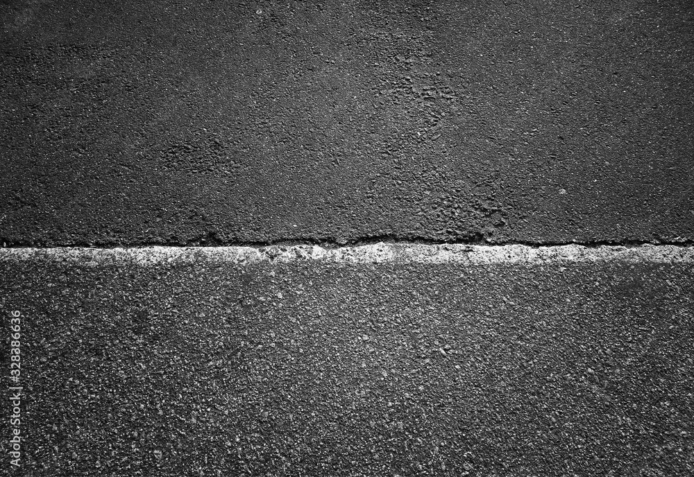 Fototapeta premium Horizontal dividing line on asphalt road