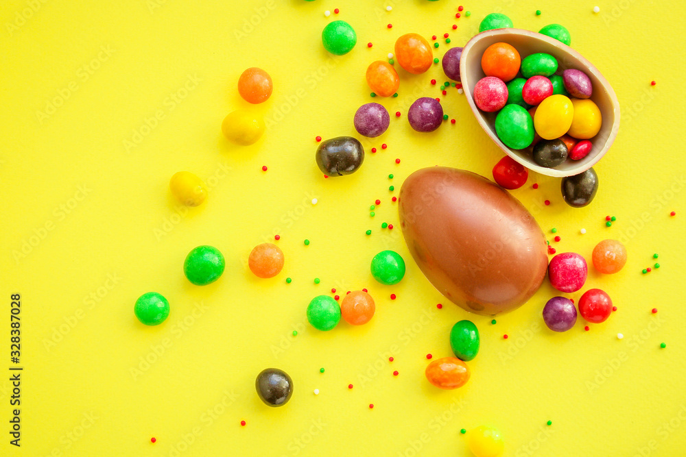 chocolate egg and candy Happy easter decor. menu concept background. top view. copy space chocolate egg and candy Happy easter decor. menu concept background. top view. copy space