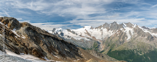 Panoramic view on Fee glacier located above the Saas-Fee village in Switzerland