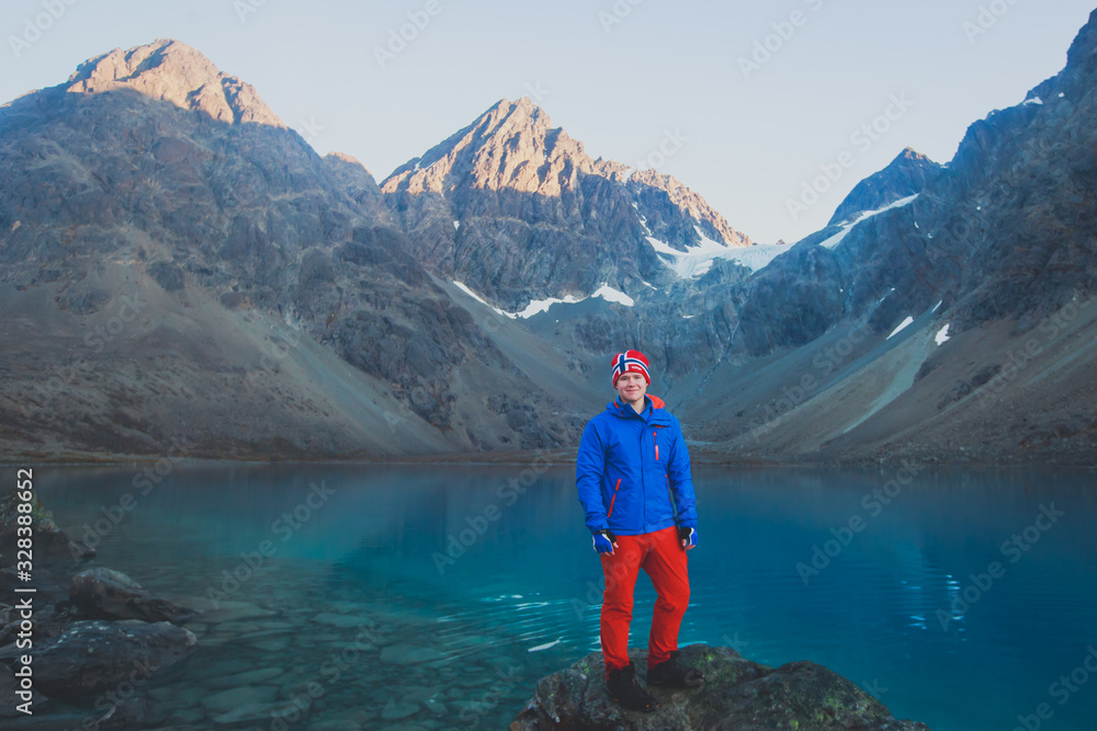 Beautiful wide view of Blavatnet - the norwegian glacial Blue Lake in Northern Norway, views of the Lyngen Alps Beautiful wide view of Blavatnet - the norwegian glacial Blue Lake in Northern Norway, views of the Lyngen Alps