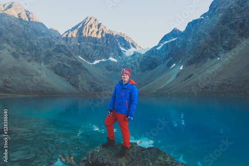 Beautiful wide view of Blavatnet - the norwegian glacial Blue Lake in Northern Norway, views of the Lyngen Alps