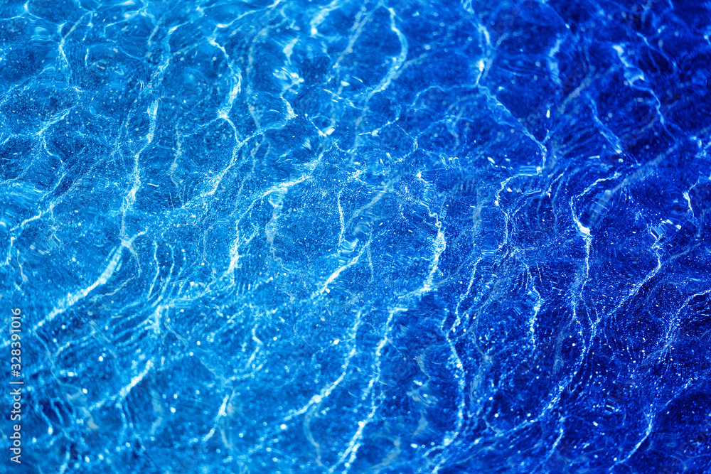 Photo background blue water of the sea