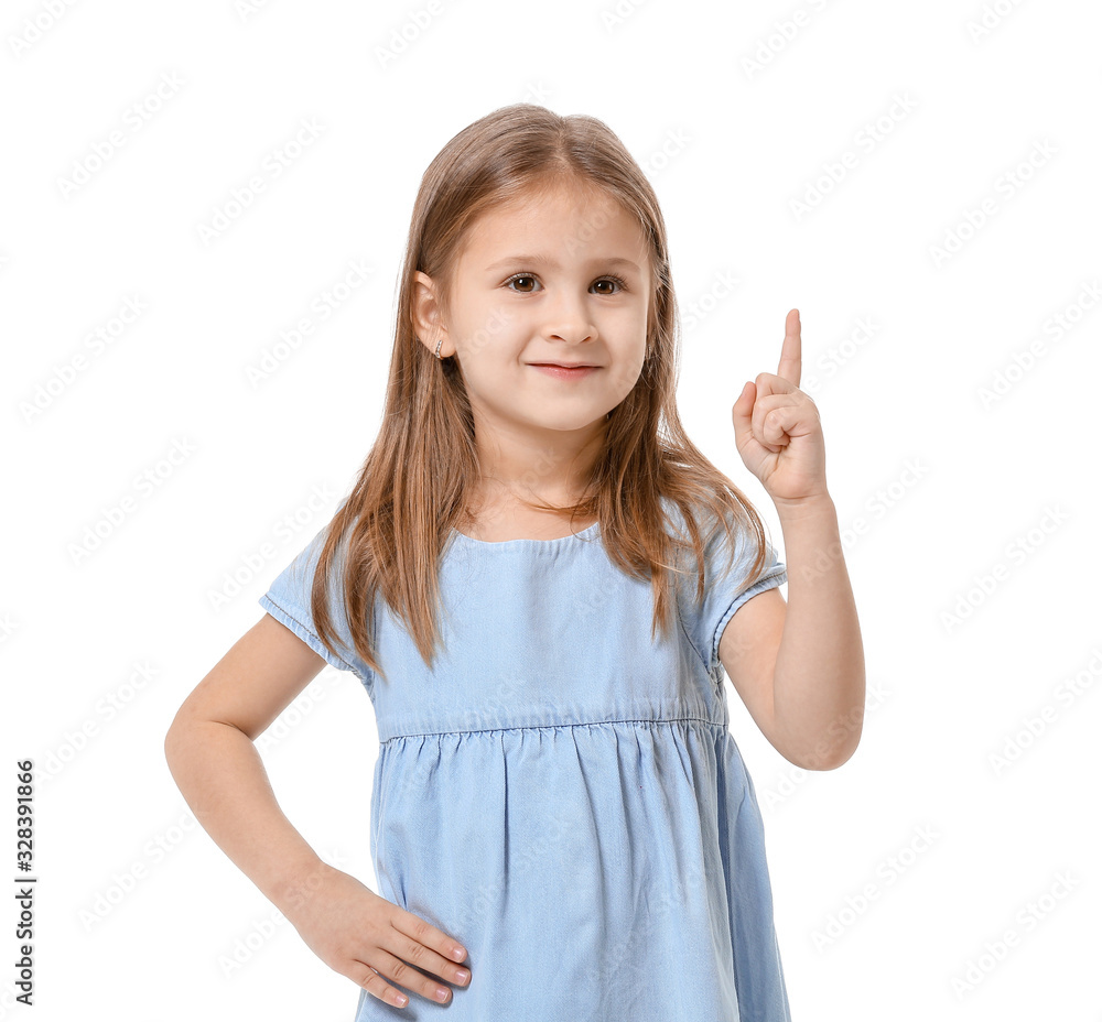 Cute little girl with raised index finger on white background Cute little girl with raised index finger on white background