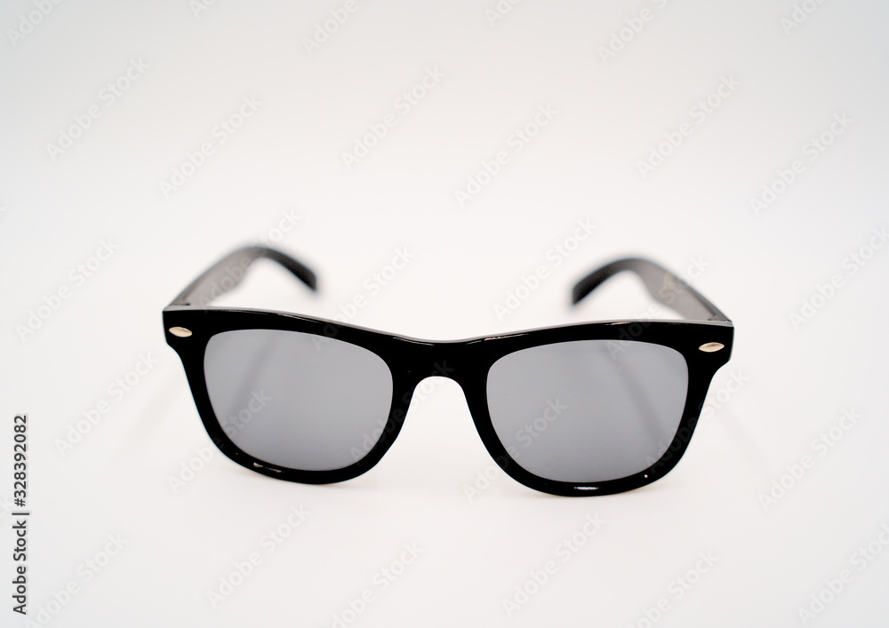 black sunglasses isolated on white background close up black sunglasses isolated on white background close up