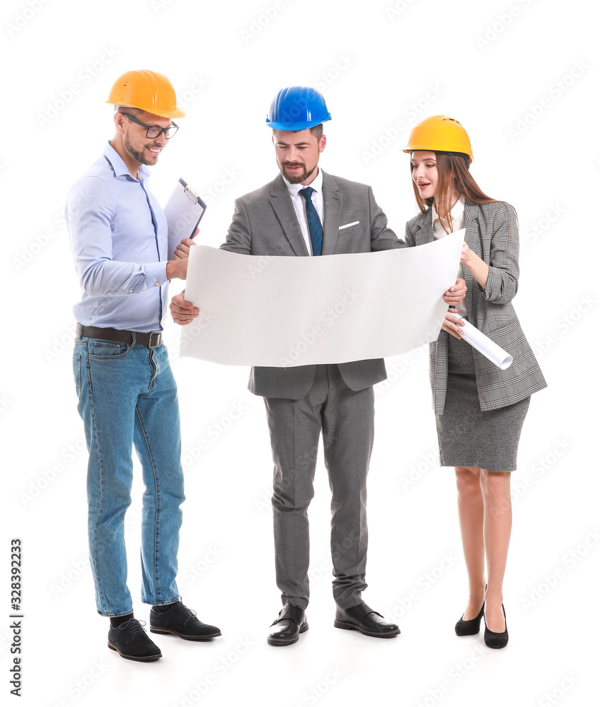 Group of engineers with drawing on white background Group of engineers with drawing on white background