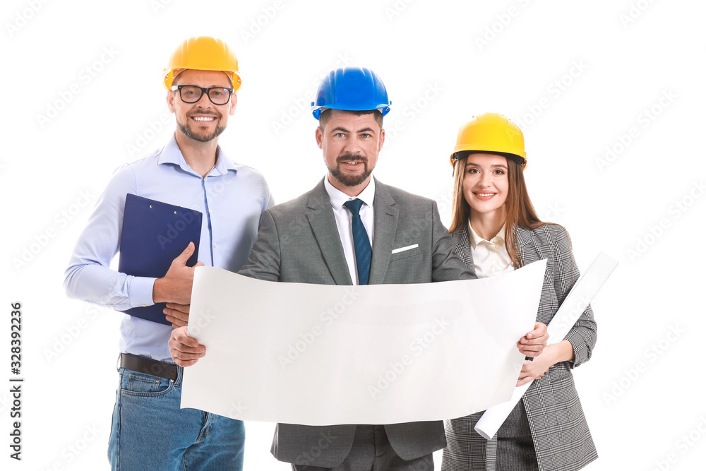 Group of engineers with drawing on white background Group of engineers with drawing on white background