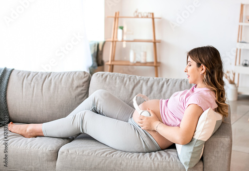 Beautiful pregnant woman pu...