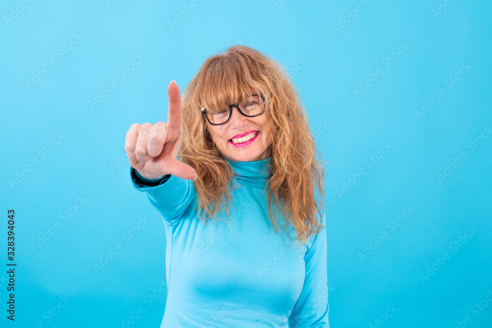 Fototapeta premium senior woman isolated on color background