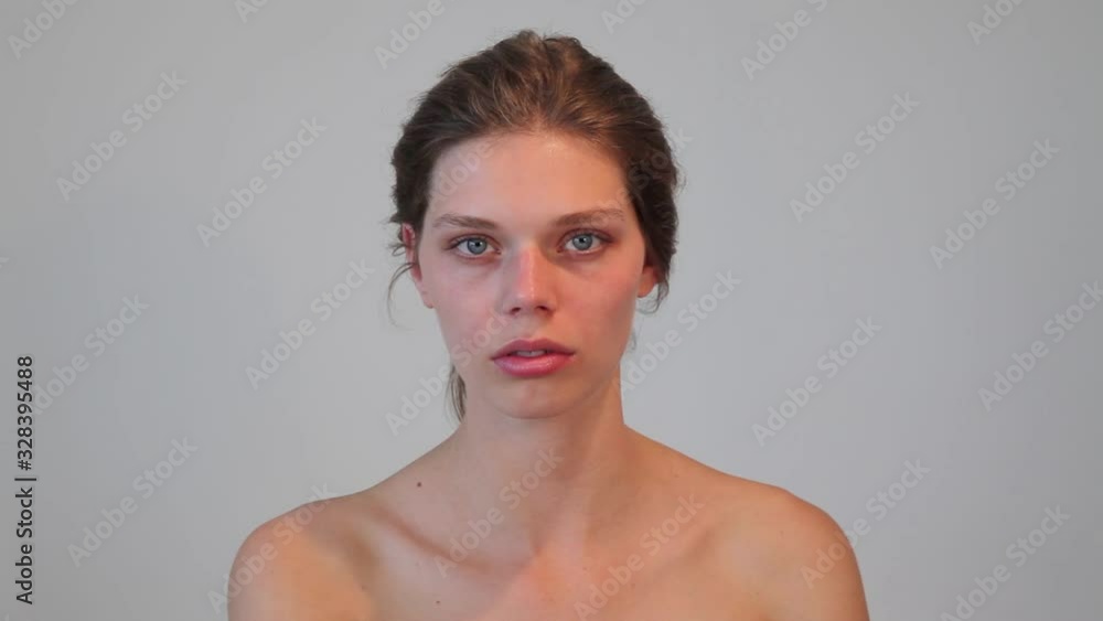 pretty girl with blue eyes looking at camera close up white background pretty girl with blue eyes looking at camera close up white background