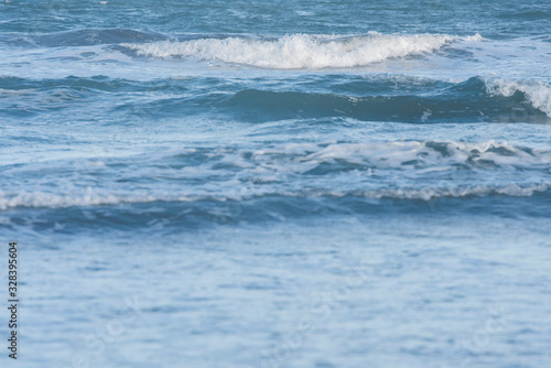 Marine detail, moving water, small waves of a calm sea, in Mar del Plata