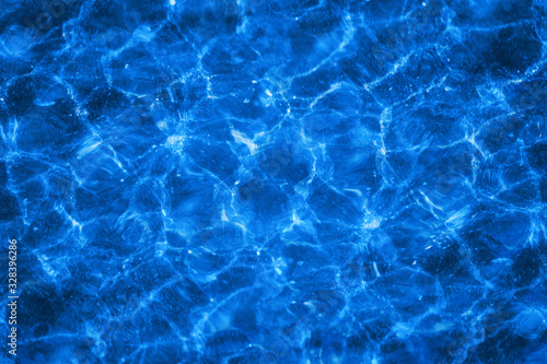 Photo background blue water of the sea