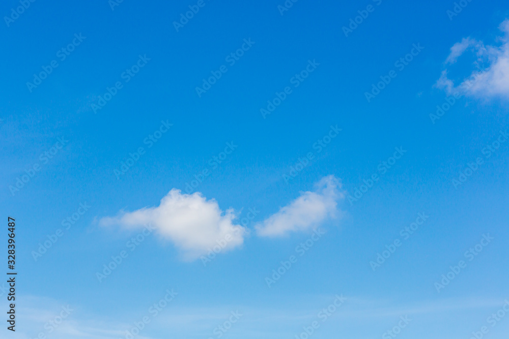 Fototapeta premium Blue sky background with tiny clouds. Sky is a beautiful patterned cloud in the daytime during the summer is a panoramic image.