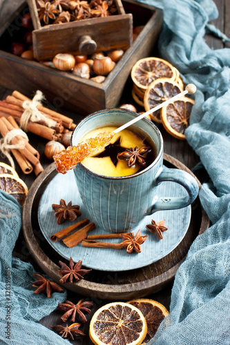 Hot tea with apple and spices. Healthy drink