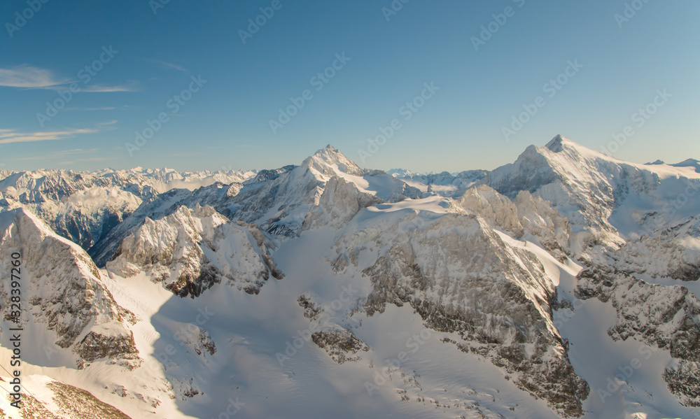 Beautiful panoramic view of snow-capped mountains in the Swiss Alps. Beautiful panoramic view of snow-capped mountains in the Swiss Alps.