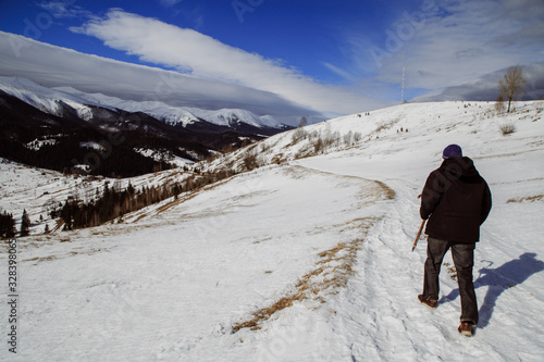 Walking near strong place Vuhatiy Kamin in the higest mountain village Dzembronya photo