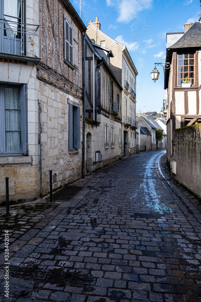 Tours, France - 03/12/2019: Medieval street en Tours. Medieval houses. Old building and houses of Tours. Tours, France - 03/12/2019: Medieval street en Tours. Medieval houses. Old building and houses of Tours.