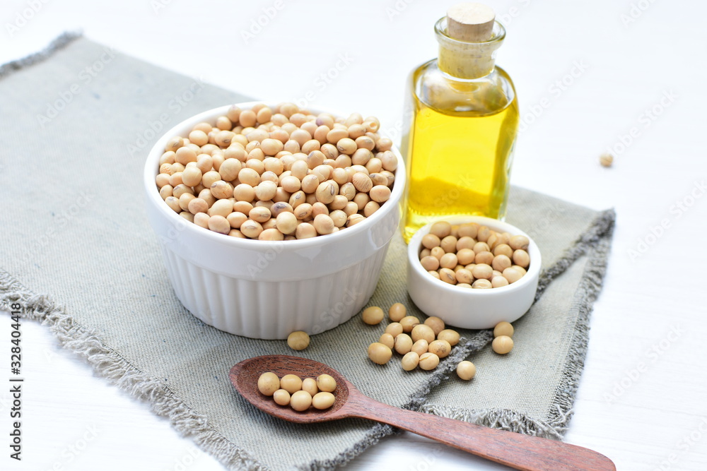 Raw soybeans (Glycine max) displayed in containers and accompanied by oil Raw soybeans (Glycine max) displayed in containers and accompanied by oil