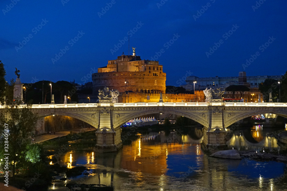 Castel St. Angelo (also called the  Mausoleum of Hadrian) and the bridge Ponte Vittorio Emanuele II and the Tiber River near the Vatican in Rome, Italy.