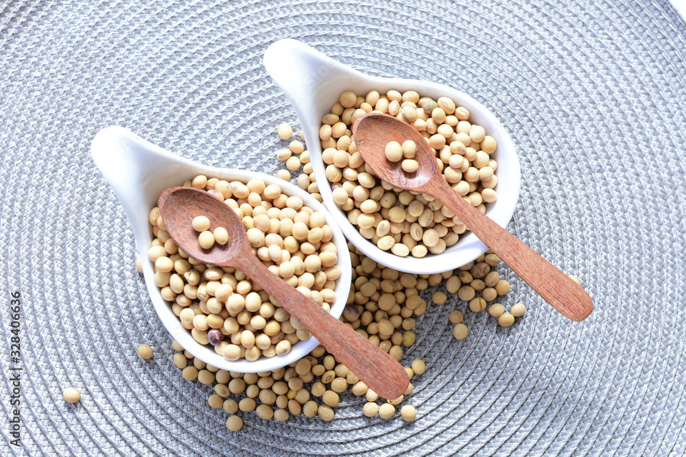 Raw soybeans (Glycine max) displayed in containers Raw soybeans (Glycine max) displayed in containers