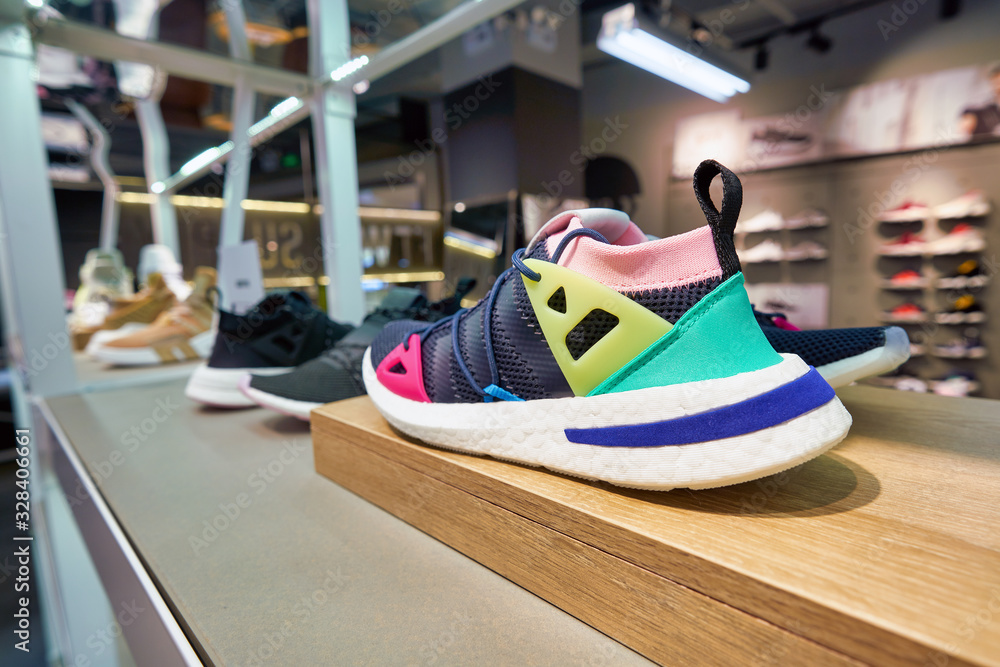 SHENZHEN, CHINA - CIRCA APRIL, 2019: sport shoes on display at Adidas store  in Shenzhen. Stock Photo | Adobe Stock