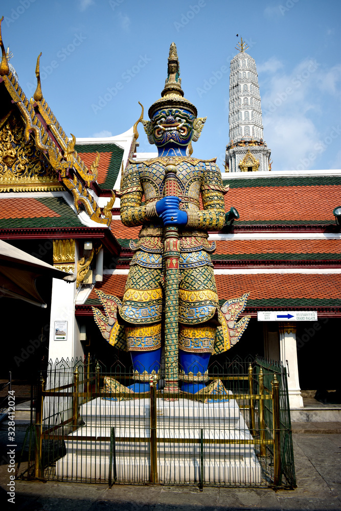 Statue of Thotsakhirithon, giant demon (Yaksha) guarding an exit at at Wat Phra Kaew, Bangkok, Thailand