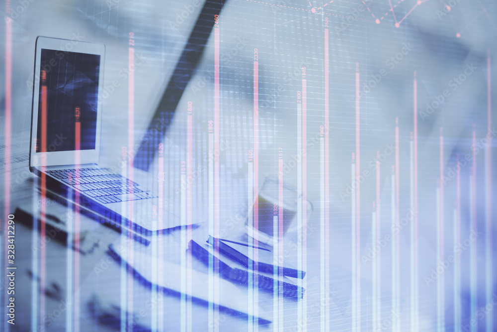 Forex graph hologram on table with computer background. Multi exposure. Concept of financial markets. Forex graph hologram on table with computer background. Multi exposure. Concept of financial markets.