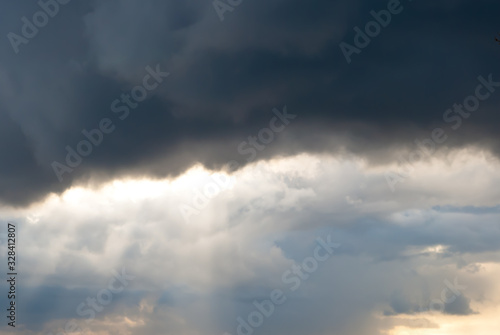 storm gray clouds and sun rays © fotofotofoto