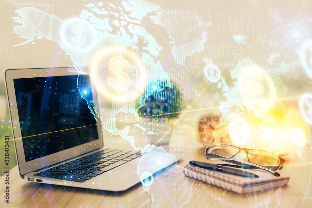 Obraz premium Forex graph hologram on table with computer background. Multi exposure. Concept of financial markets.