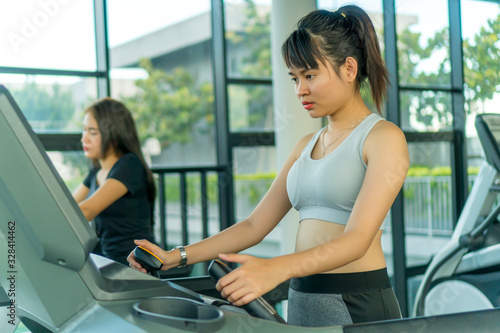 Cute Asian girl at the gym