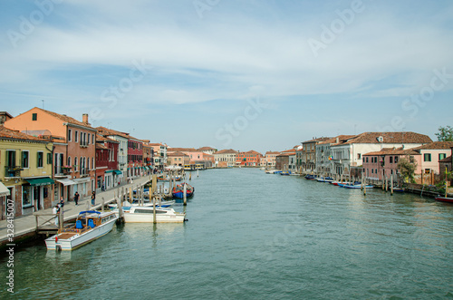 Venice  Italy May 18  2015  View of beautiful canals and boats docked alongside the walkways in Venice Italy