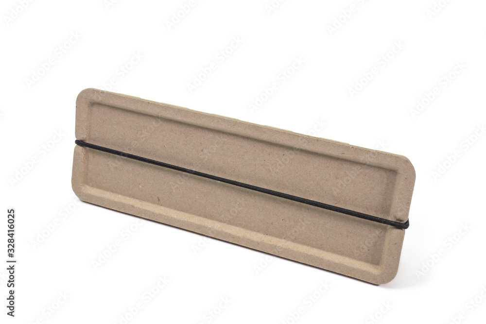 The close up of pen and pencil case box storage (recycle paper box) on white background. The close up of pen and pencil case box storage (recycle paper box) on white background.