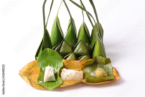 Khanom Sod-Sai thai name (Steamed Flour with Coconut Filling). Ancient Thailand dessert wrapped in banana leaves.