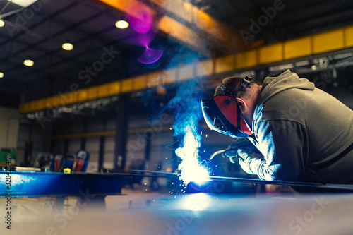 Tableau sur toile Professional welder with protection mask