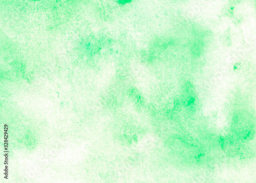 Green abstract macro watercolor hand drawn paper texture. Wet brush painted smudges and stains background. Decorative design card for banner, print, decor, template