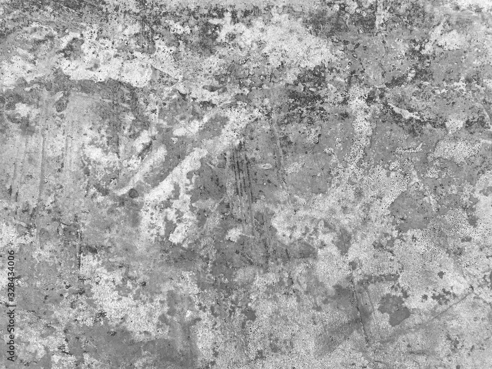 The surface of the concrete wall.  Black and white tones. For background.