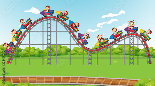 Scene with happy monkeys riding on roller coaster in the park