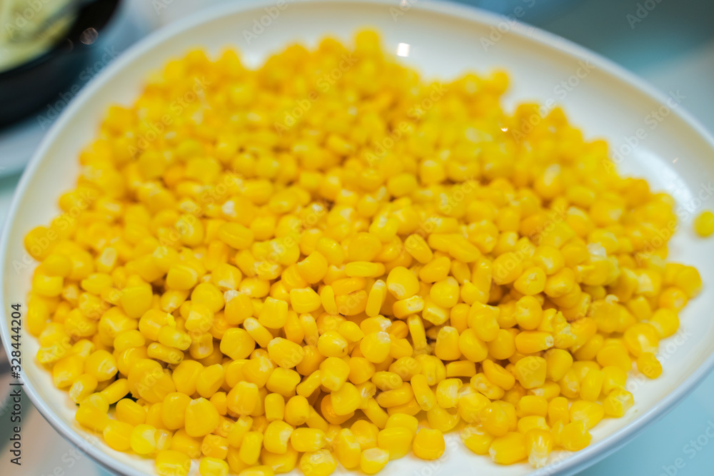 Fried corn with butter and seasonings Fried corn with butter and seasonings